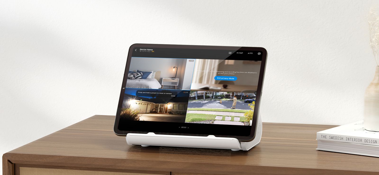 Tablet on the Tapo H500 Smart HomeBase showing four camera views